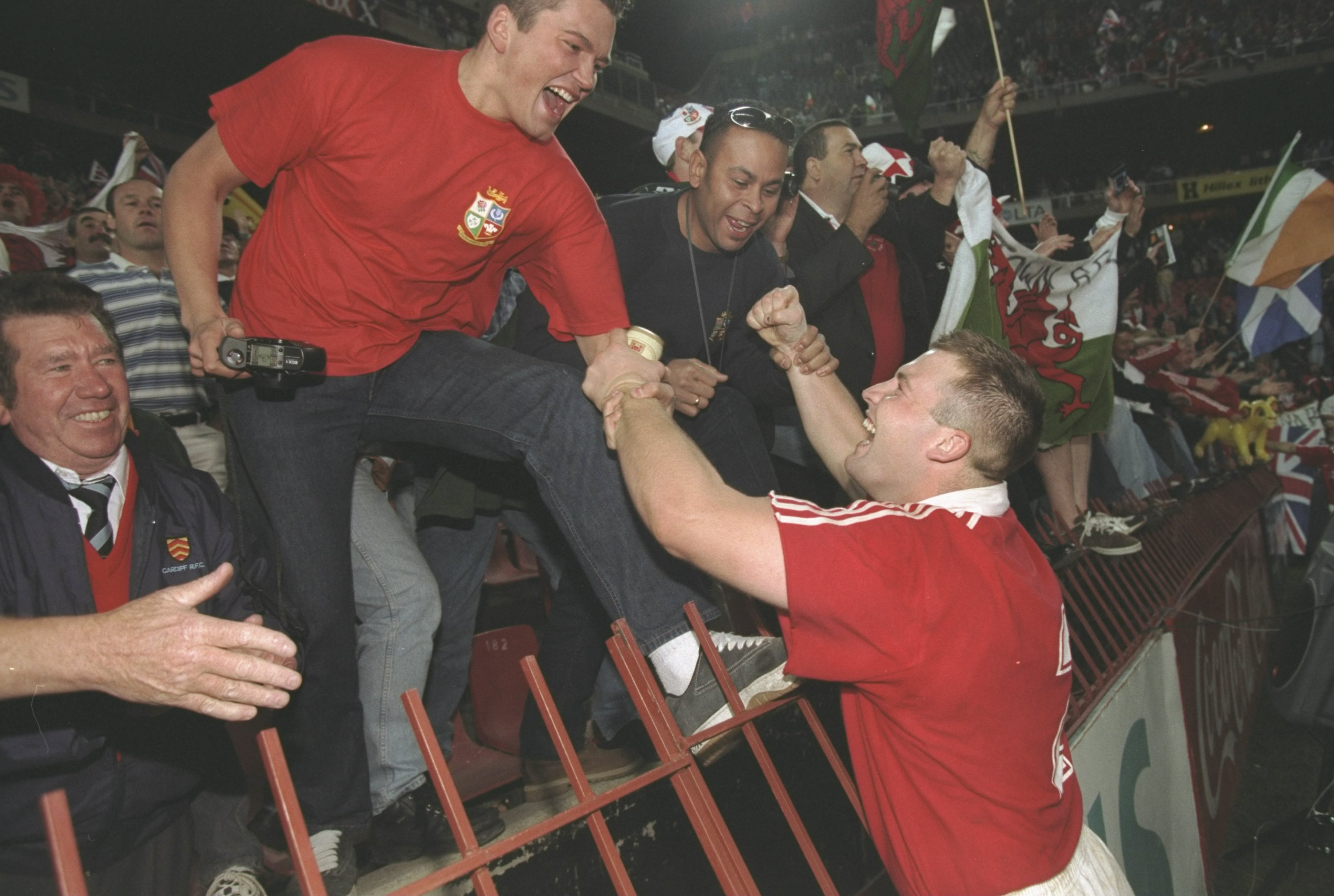 5 Jul 1997:  Mark Regan of the British Lions (right) celebrates with supporters after the third test match against South Africa at Ellis Park in Johannesburg, South Africa. South Africa won the match 35-16 but the British Lion won the series 2-1.  Mandatory Credit: Alex Livesey /Allsport