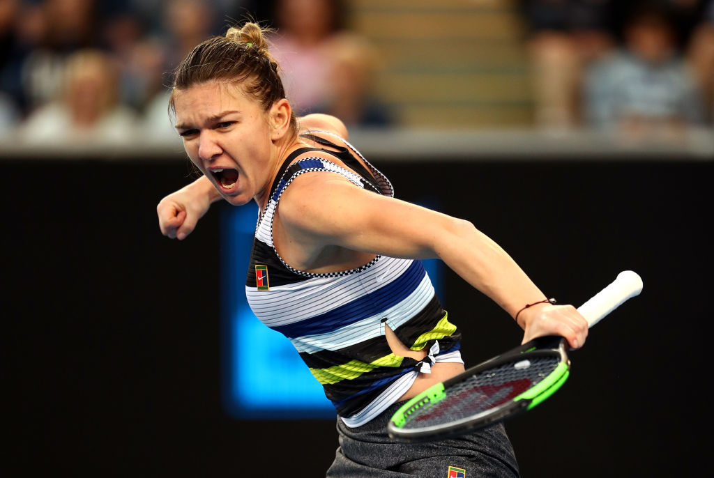 MELBOURNE, AUSTRALIA - JANUARY 19:  Simona Halep of Romania celebrates winning a point in her third round match against Venus Williams of the United States during day six of the 2019 Australian Open at Melbourne Park on January 19, 2019 in Melbourne, Australia.  (Photo by Julian Finney/Getty Images)