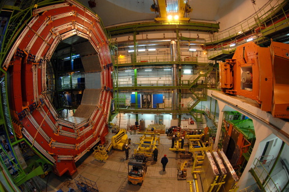SWITZERLAND - JANUARY 25: The Large Hadron Collider, Large Hadron Collider (LHC) is a particle accelerator which will probe deeper into matter than ever - This is the next step of CERN - The workers positioned one of the CMS magnet - The CMS is the largest superconducting solenoid magnet of the world has reached full field - Weighing over 10,000 tons, the magnet of the CMS Collaboration is built around a superconducting solenoid 6 meters in diameter and 13 meters in length - It produces a field of 4 Tesla, almost 100 000 times higher than that of the Earth, and stores an energy of 2.5 GJ, sufficient to melt 18 tons of gold in Geneve, Switzerland on January 25th, 2007. (Photo by Lionel FLUSIN/Gamma-Rapho via Getty Images)