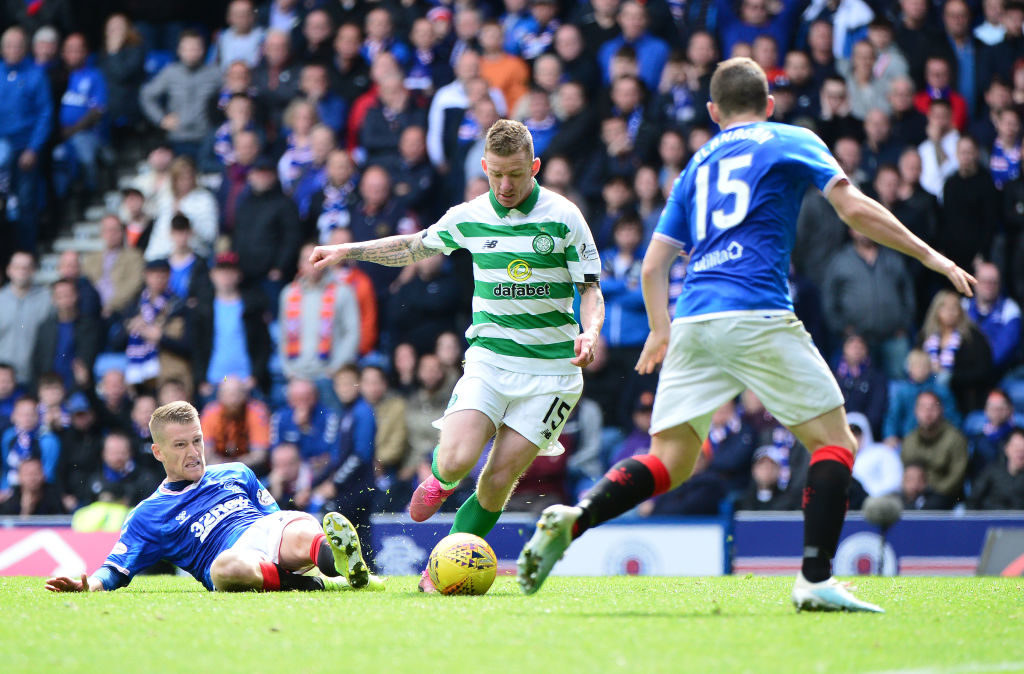 GLASGOW, SCOTLAND - SEPTEMBER 01: Jonny Hayes of Celtic takes on Steven Davis of Rangers during the Ladbrokes Premiership match between Rangers and Celtic at Ibrox Stadium on September 1, 2019 in Glasgow, Scotland. (Photo by Mark Runnacles/Getty Images)