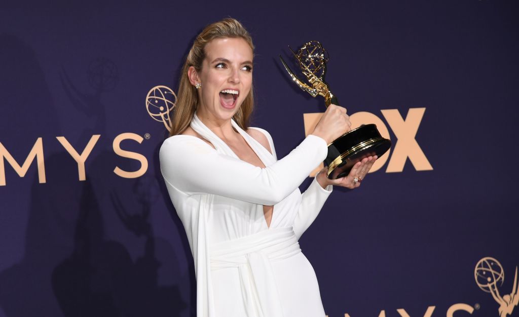 TOPSHOT - British actress Jodie Comer poses with the Emmy Outstanding Lead Actress in a Drama Series award for "Killing Eve" during the 71st Emmy Awards at the Microsoft Theatre in Los Angeles on September 22, 2019. (Photo by Robyn Beck / AFP)        (Photo credit should read ROBYN BECK/AFP via Getty Images)