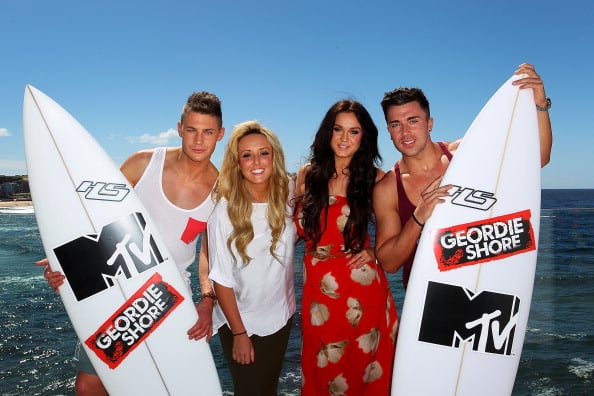 SYDNEY, AUSTRALIA - MARCH 05:  Scott Timlin, Charlotte Letitia Crosby, Vicky Pattison and James Tindale of UK reality TV series, Geordie Shore, pose for a photo at Bondi Beach on March 5, 2013 in Sydney, Australia.  (Photo by Lisa Maree Williams/Getty Images)
