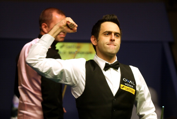 SHEFFIELD, ENGLAND - MAY 06:  Ronnie O'Sullivan of England celebrates beating Barry Hawkins of England to win the Betfair World Snooker Championship at the Crucible Theatre on May 6, 2013 in Sheffield, England.  (Photo by Warren Little/Getty Images)