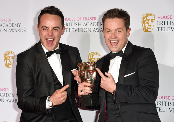 LONDON, ENGLAND - MAY 10:  Anthony McPartlin (L) and Declan Donnelly, winners of Best Entertainment Programme for 'Ant & Dec Saturday Night Takeaway', pose in the winners room at the House of Fraser British Academy Television Awards at Theatre Royal on May 10, 2015 in London, England.  (Photo by Karwai Tang/WireImage)