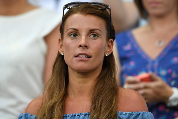 Coleen Rooney, wife of England's forward Wayne Rooney, attends the Euro 2016 round of 16 football match between England and Iceland at the Allianz Riviera stadium in Nice on June 27, 2016.  
England lost 2-1 to Iceland. / AFP / PAUL ELLIS        (Photo credit should read PAUL ELLIS/AFP via Getty Images)