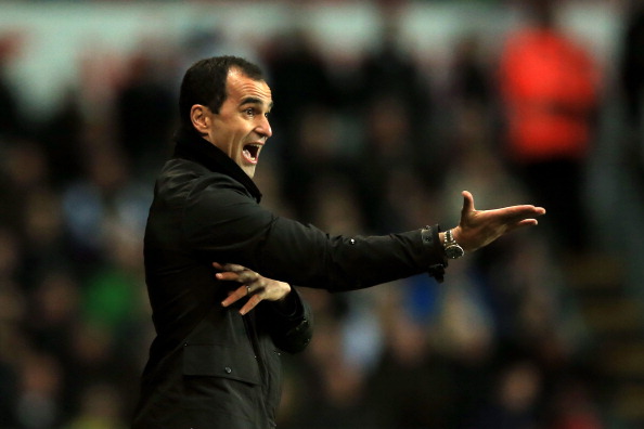 SWANSEA, WALES - DECEMBER 22:  Roberto Martinez the Everton manager reacts during the Barclays Premier League match between Swansea City and Everton at the Liberty Stadium on December 22, 2013 in Swansea, Wales.  (Photo by Richard Heathcote/Getty Images)