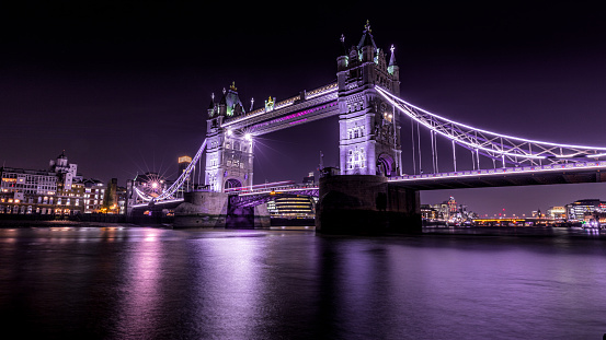Illuminated Tower Bridge Over River Thames At Night