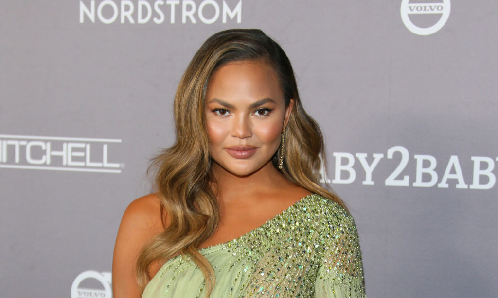 Why is Chrissy Teigen always in a towel? Pregnant model's favourite outfit explained