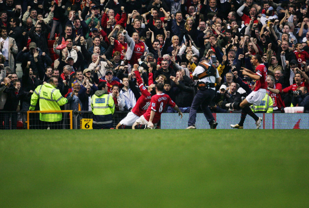 Wayne Rooney celebrates ending Arsenal's unbeaten run