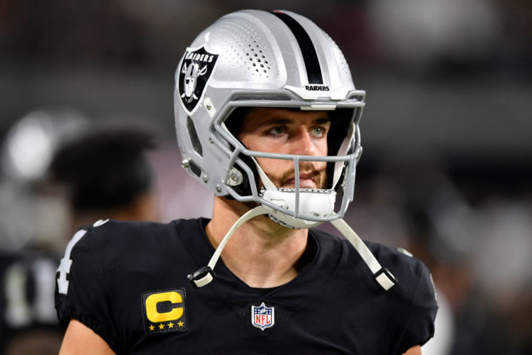 What is the meaning of Derek Carr's wrist tattoos?