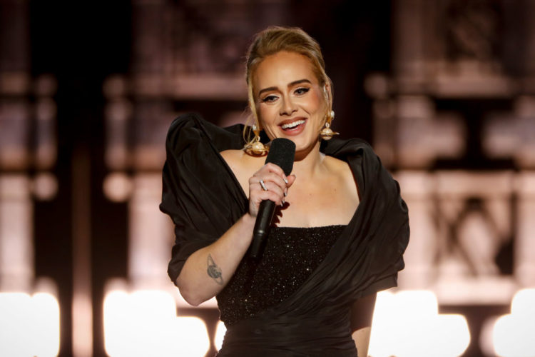 Who designed Adele's elegant Saturn earrings from CBS One Night Only?