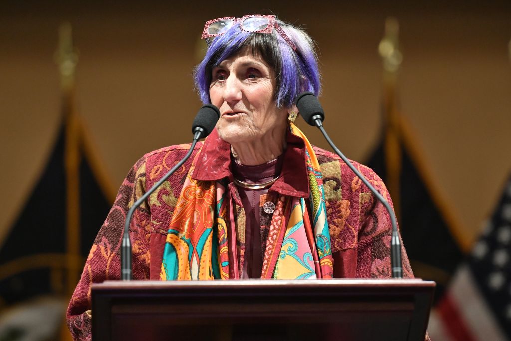 The purple-haired congresswoman you saw at SOTU is Rosa DeLauro
