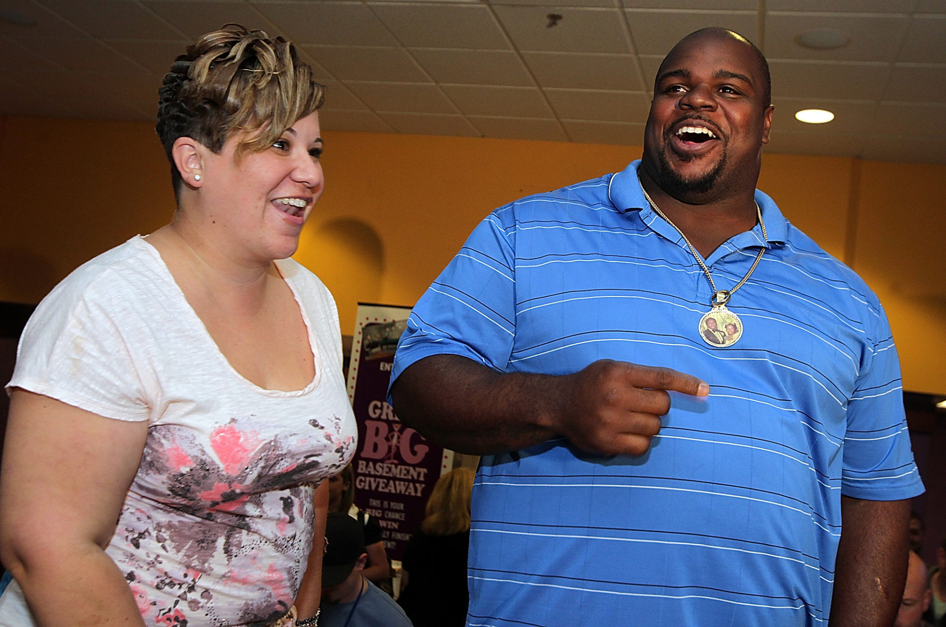 (042811 Milford, MA) Vince Wilfork and his wife Bianca have a laugh during the Vince Wilfork Draft Day Fundraiser at Pinz  Thursday, April 28, 2011.  Staff Photo by Matt Stone