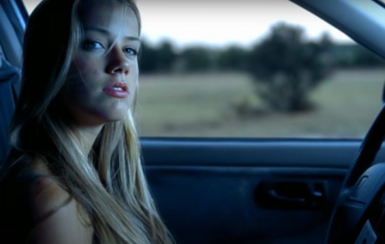 WATCH: Amber Heard in Kenny Chesney’s music video for There Goes My Life