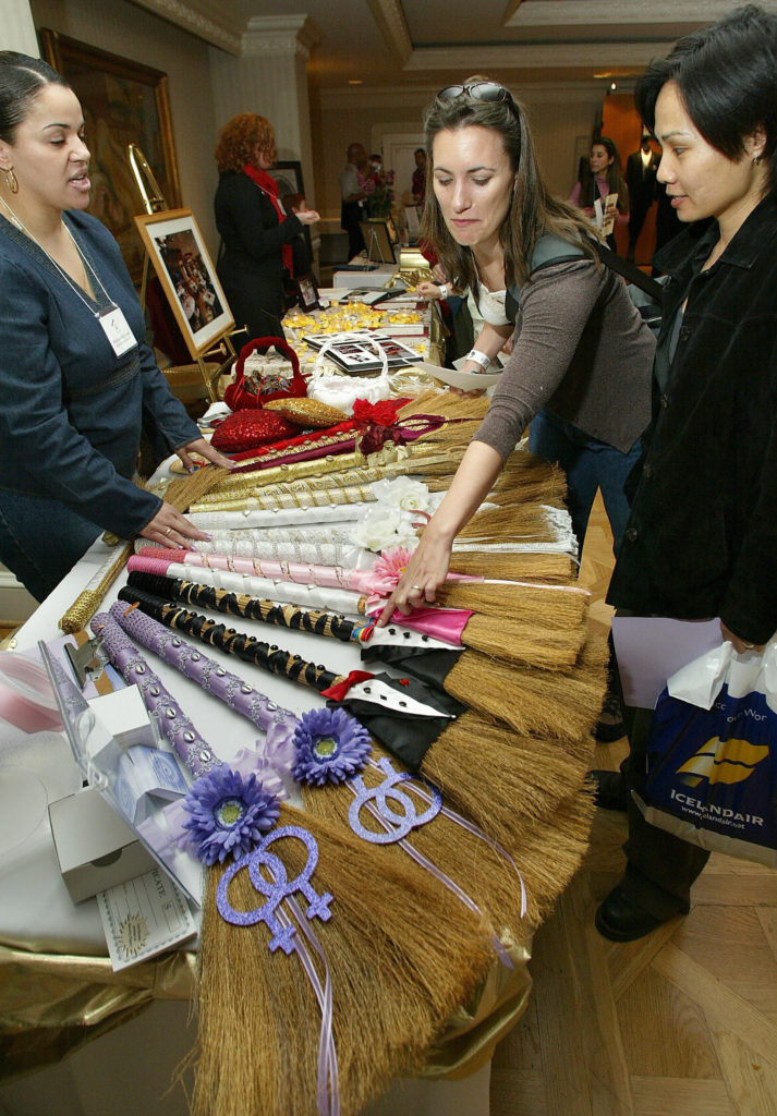 Catherine Burriss (C) looks at "wedding