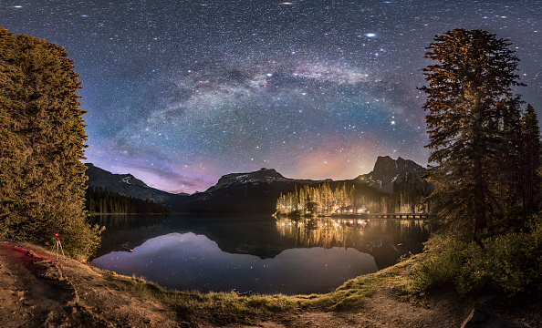 The Milky Way arching over Emerald Lake and Emerald Lake Lodge in Yoho National Park