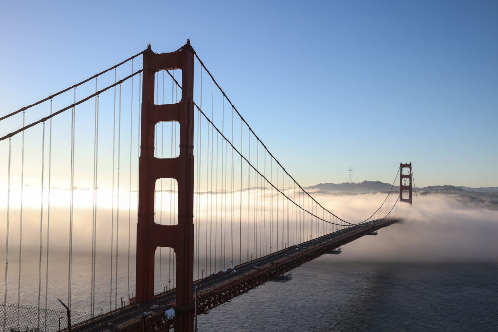 Sunrise with foggy morning over Golden Gate Bridge