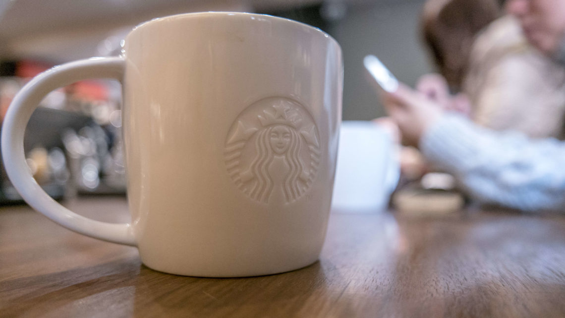 Logo of Starbucks on a coffee mug.  Starbucks already has