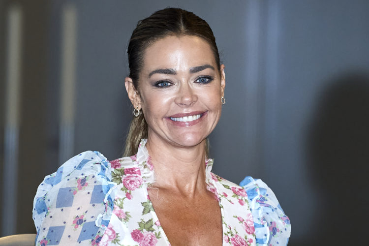 B&B Denise Richards 'rolling into the week' with roller skates and green shorts