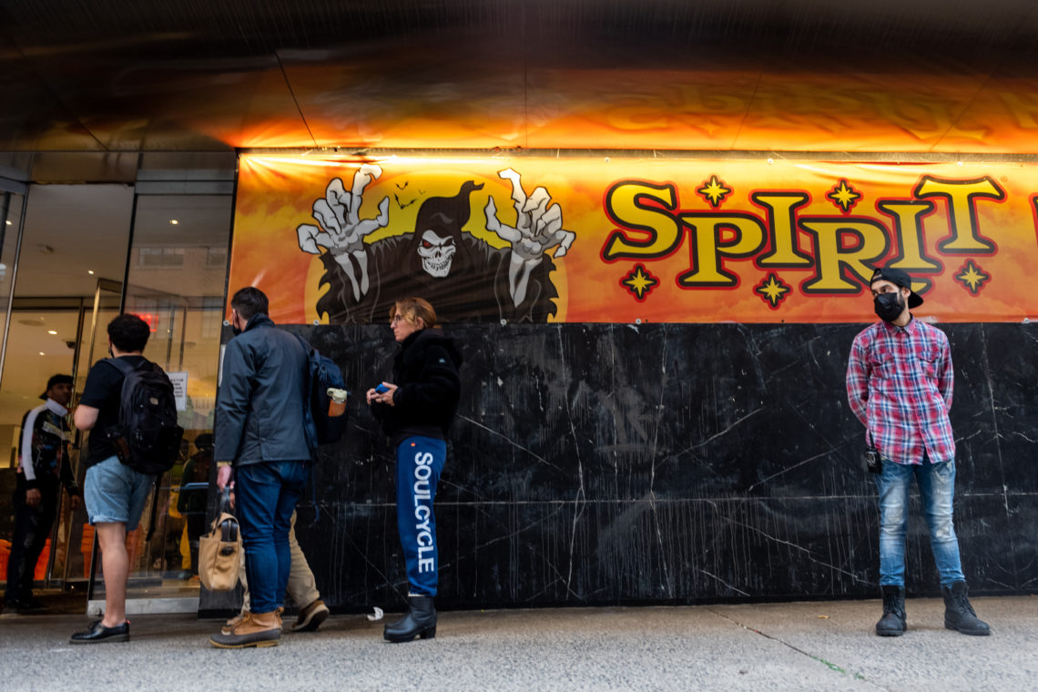 Customers queue outside a Spirit Halloween store in New York City