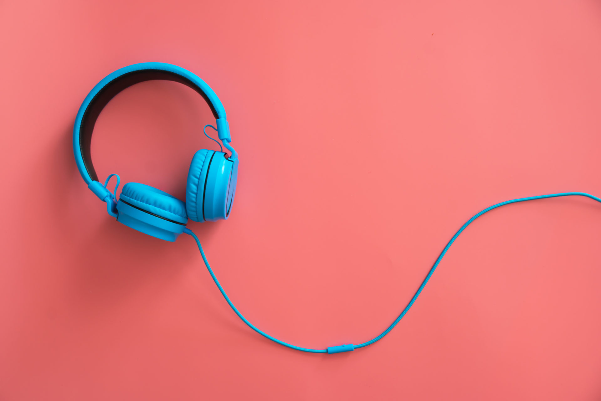 Headphones on the pink background
