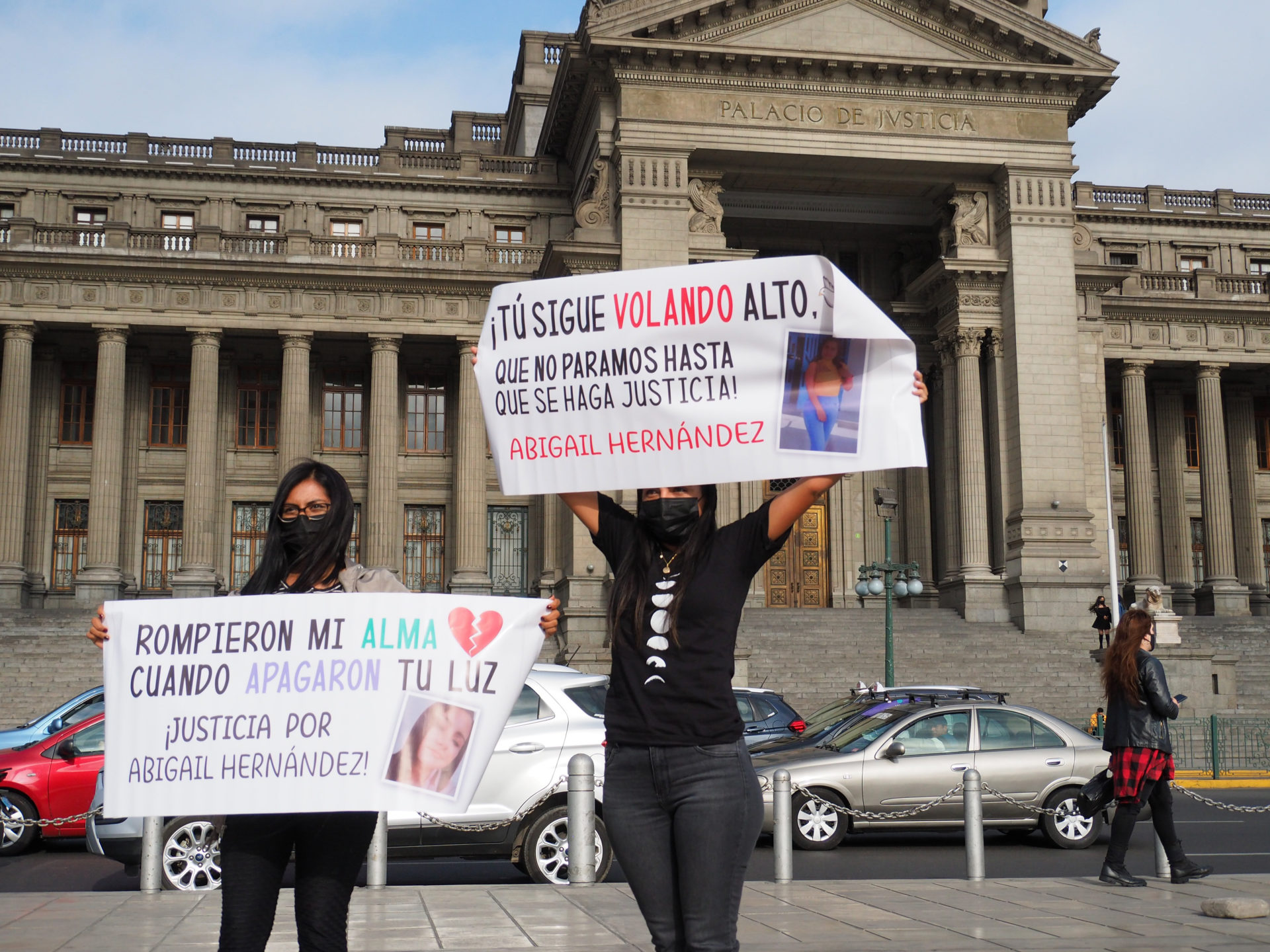Banners calling for justice for victims of femicide when...