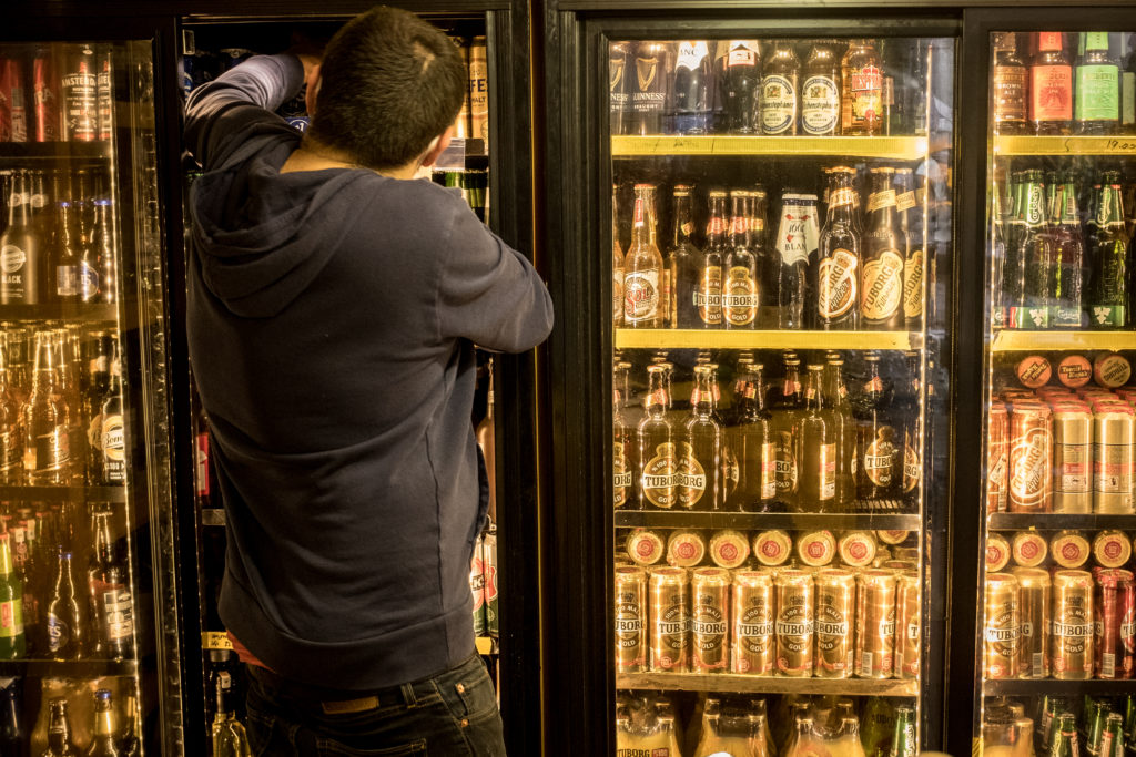 An employee stocks alcohol at a shop on April 28, 2021 in Istanbul, Turkey. The Turkish government announced a new full three week lockdown between...